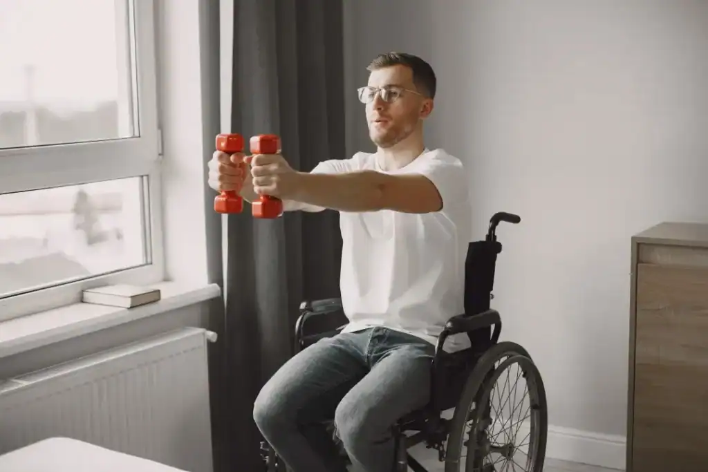 Image of man doing exercise in his wheelchair to aid weight loss Banbury