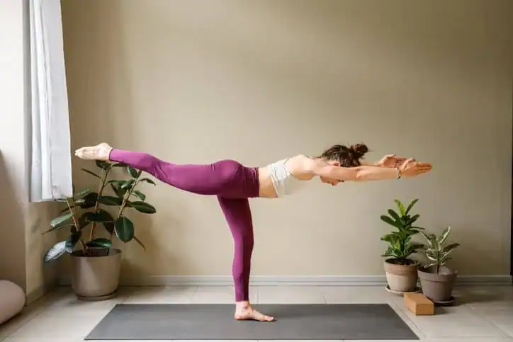 Woman doing Yoga exercise Banbury to help with toning the body. 