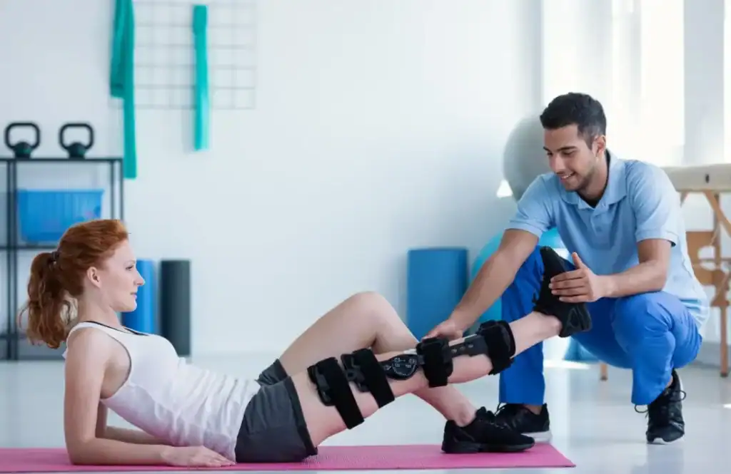 Woman having treatment to help muscle recovery Banbury after an injury